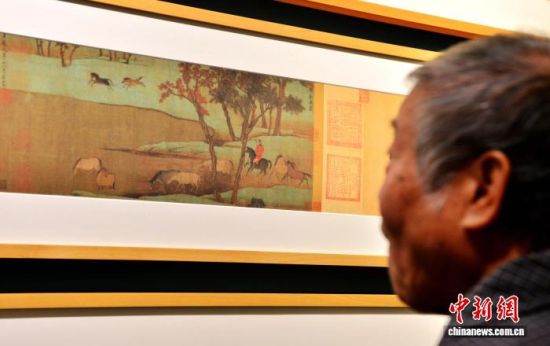 11月26日,展出的《秋郊饮马图》调色样稿。中新社记者 张斌 摄 11月26日,展出的《秋郊饮马图》调色样稿。中新社记者 张斌 摄