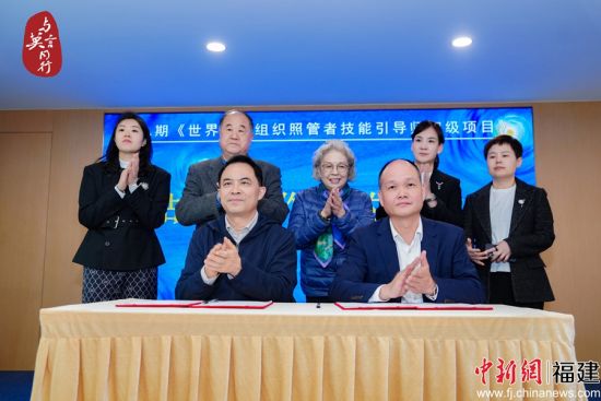 ����3��19����22�գ��ھ��ڡ�����������֯�չ��߼�������ʦ������Ŀ���ߡ�����ͬ�С����¶�֢��ͯ��ͥ�������ܼƻ����ڸ����������У�ͼΪǩԼ��ʽ��(���췽��ͼ)